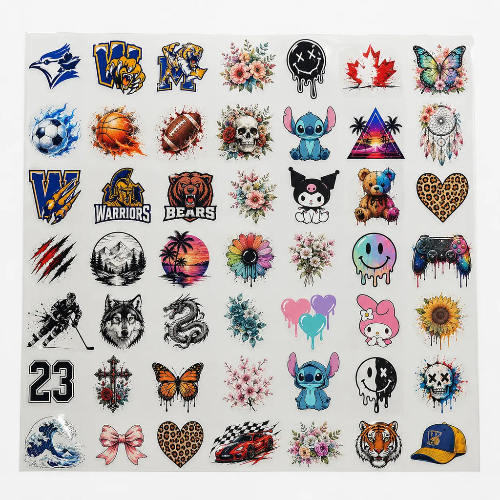 DTF gang sheet packed with dozens of full-color designs on a clear transfer film